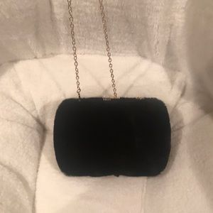 Black faux fur bag